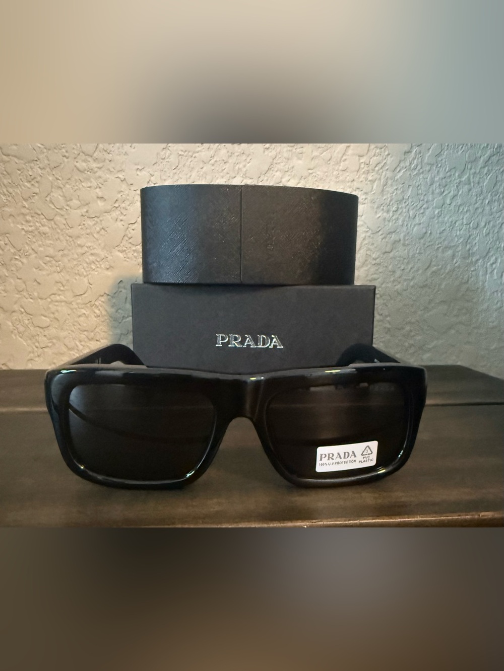 Prada Black Frame Sunglasses with Dark Lenses